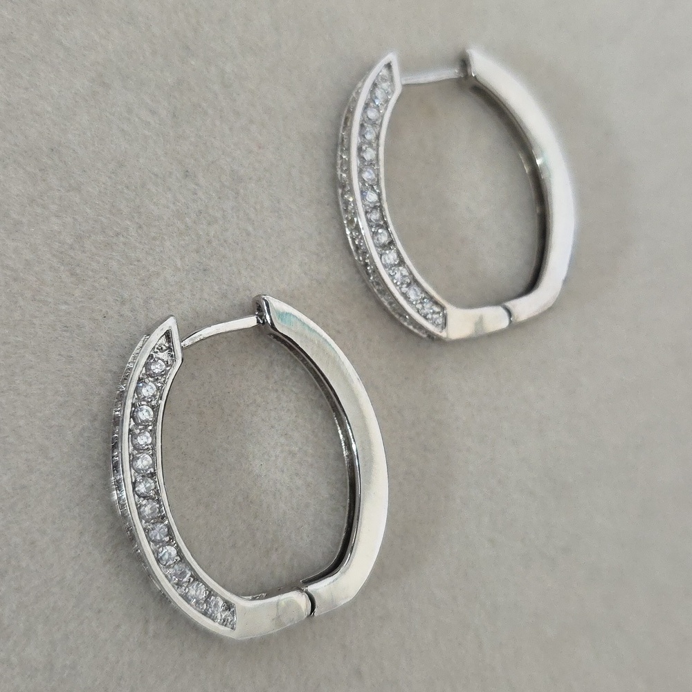 Silver Rhodium Overlay Oval Huggie Hoop Earrings with Cubic Zirconia Accents